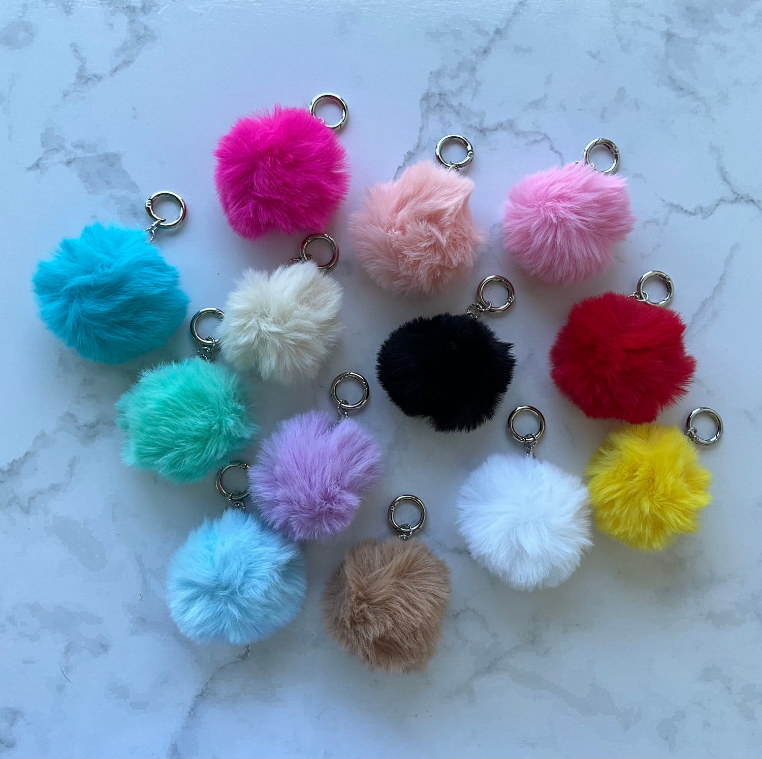 PUFFER POM POM’S