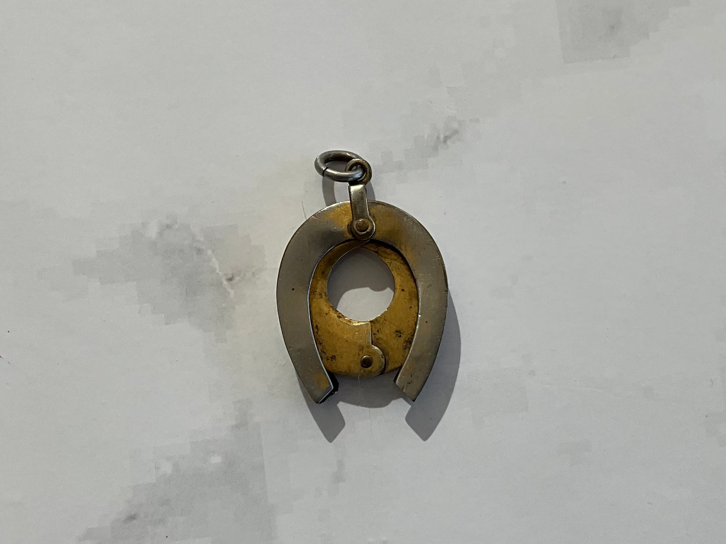 Vintage Horseshoe Cigar Cutter Pendant